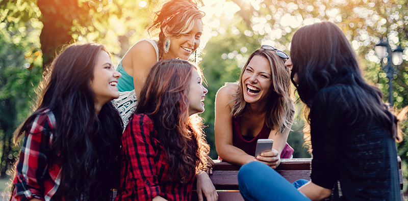 Teenage girls having fun in the park